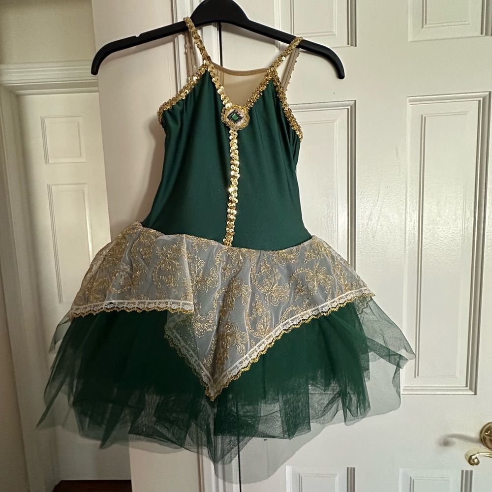 Green and gold ballet costume with matching arm and bun accessories